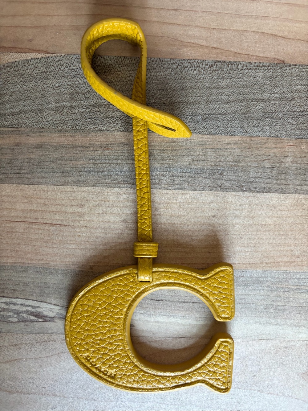 Coach Pebbled Leather Large “C” Bag Charm